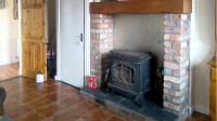 Sitting room with wood burning stove in Gapple Holiday Cottage, Rathmullan self-catering accommodation, County Donegal on the Wild Atlantic Way, Irelan
